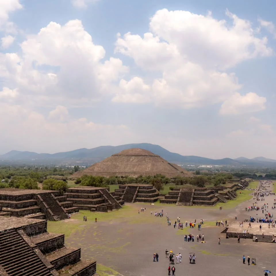 A view across a stepped archaeological landscape in Mexico.